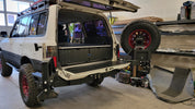 Land Cruiser 80 Series LX450 with dual drawers and sleeping platform for vehicle storage.