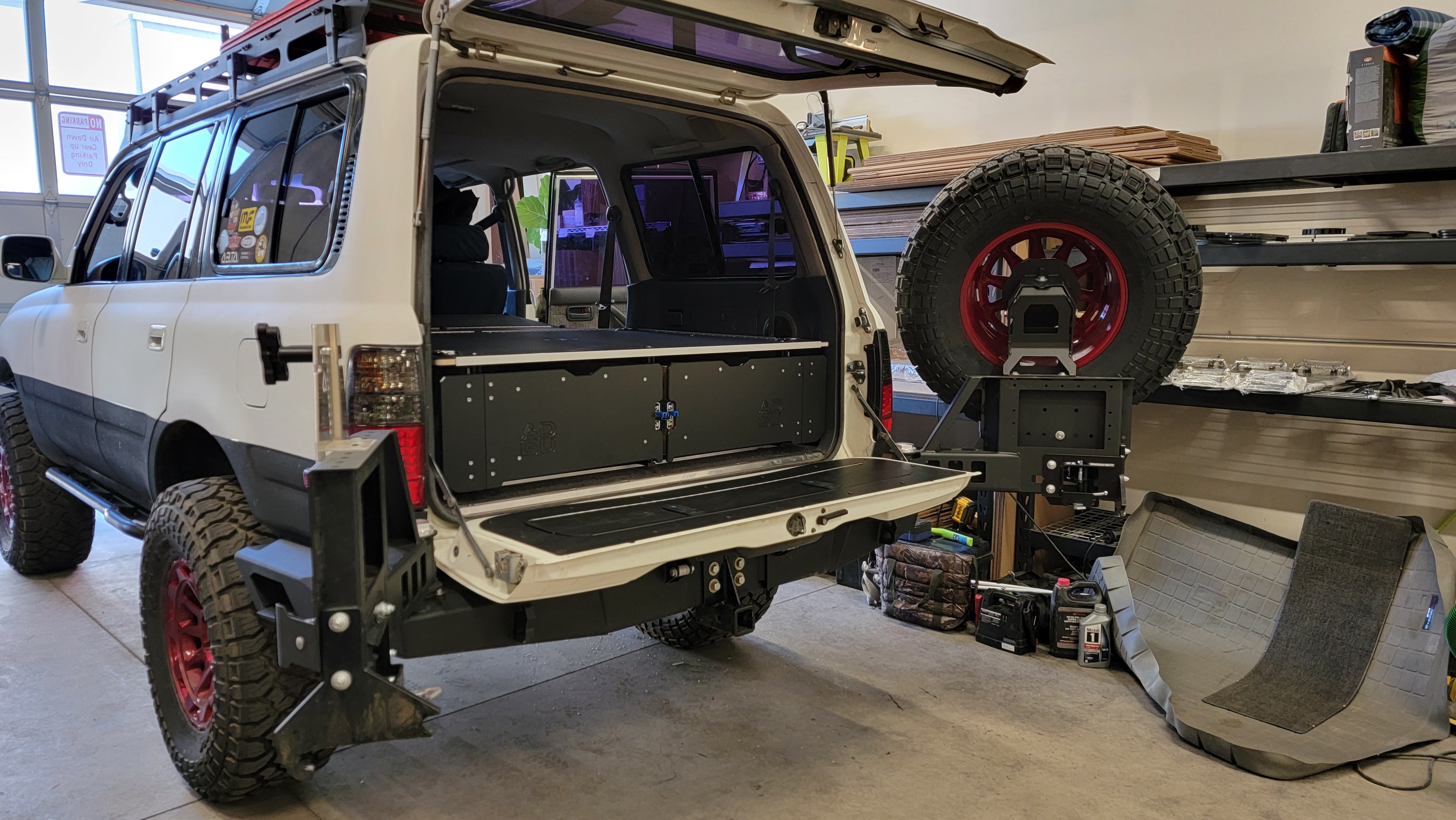 Land Cruiser 80 Series LX450 with dual drawers and sleeping platform for vehicle storage.